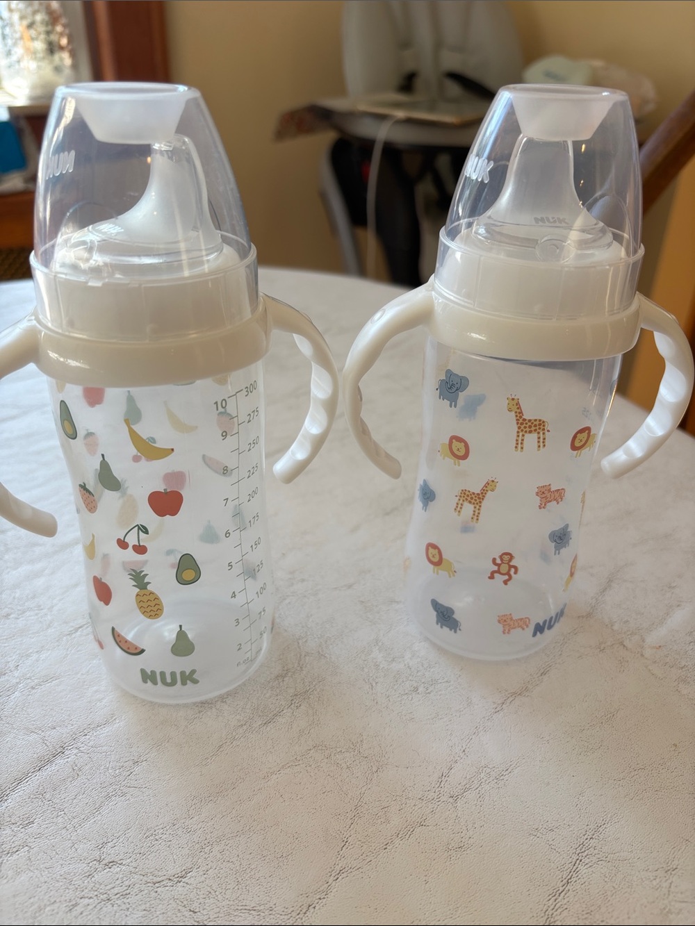 NUK New, Never Used White Sippy Bottle with Handles - Fruit & Safari Prints
